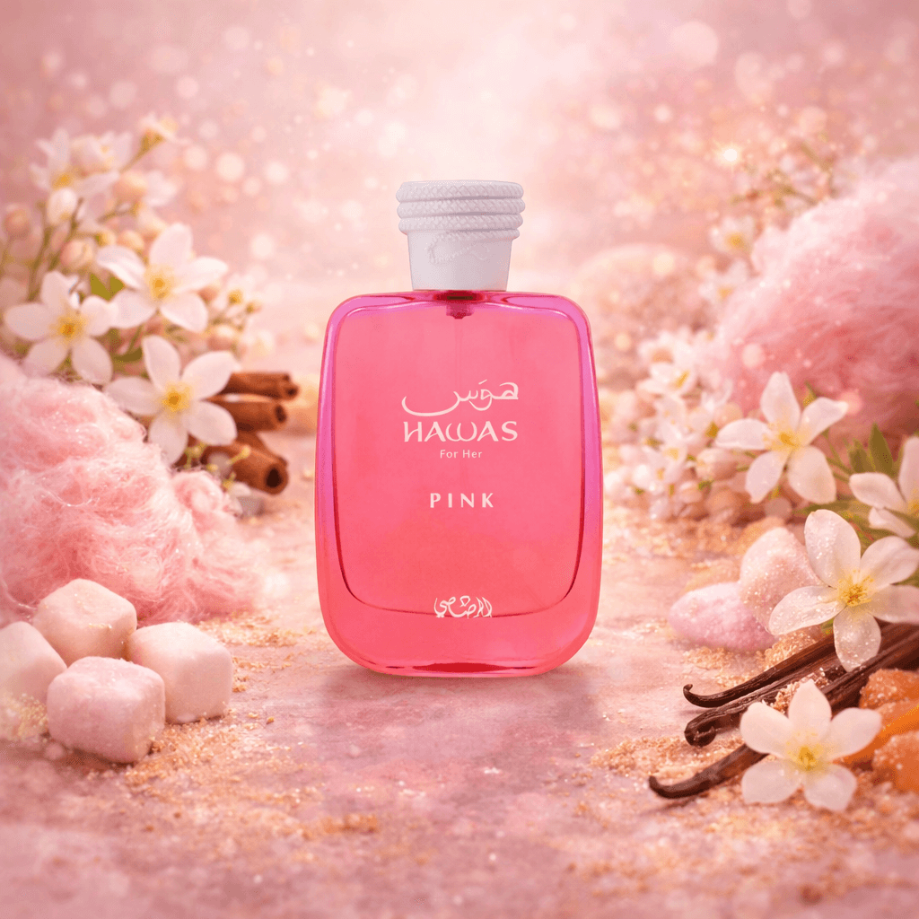 Rasasi Hawas Pink EDP Decant Sample Pink perfume bottle with floral and spice elements on a soft pink background